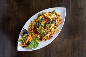 Mela Modern Indian Cuisine signature dishes Tandoori ChickenPalak PaneerVegetable Biryani